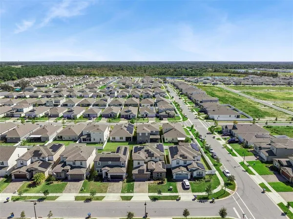 an aerial view of multiple house