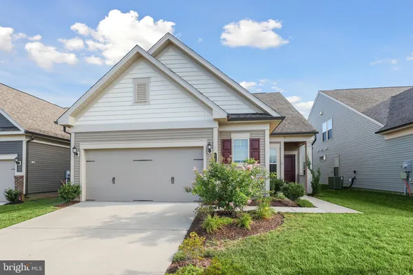 a front view of house with yard