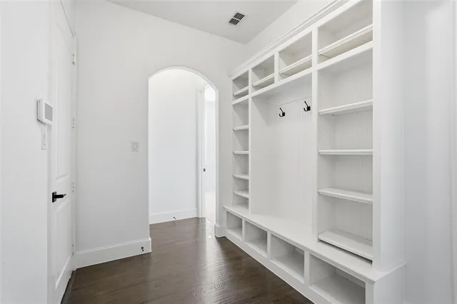 a view of an empty walk in closet