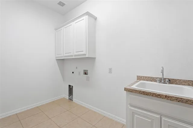 a bathroom with a sink and vanity