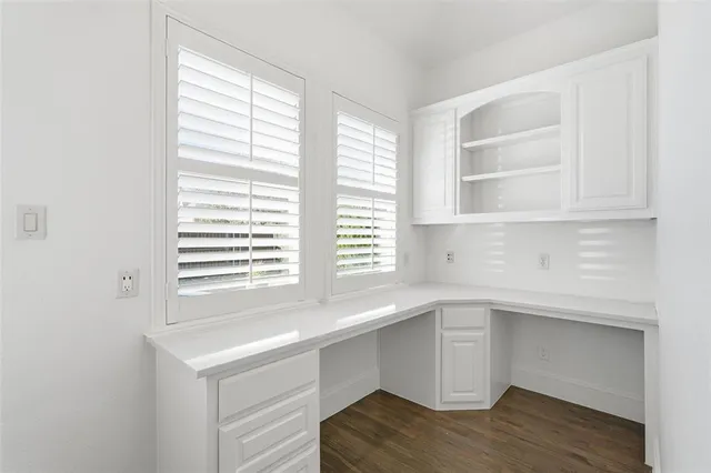 a room with a sink and a window