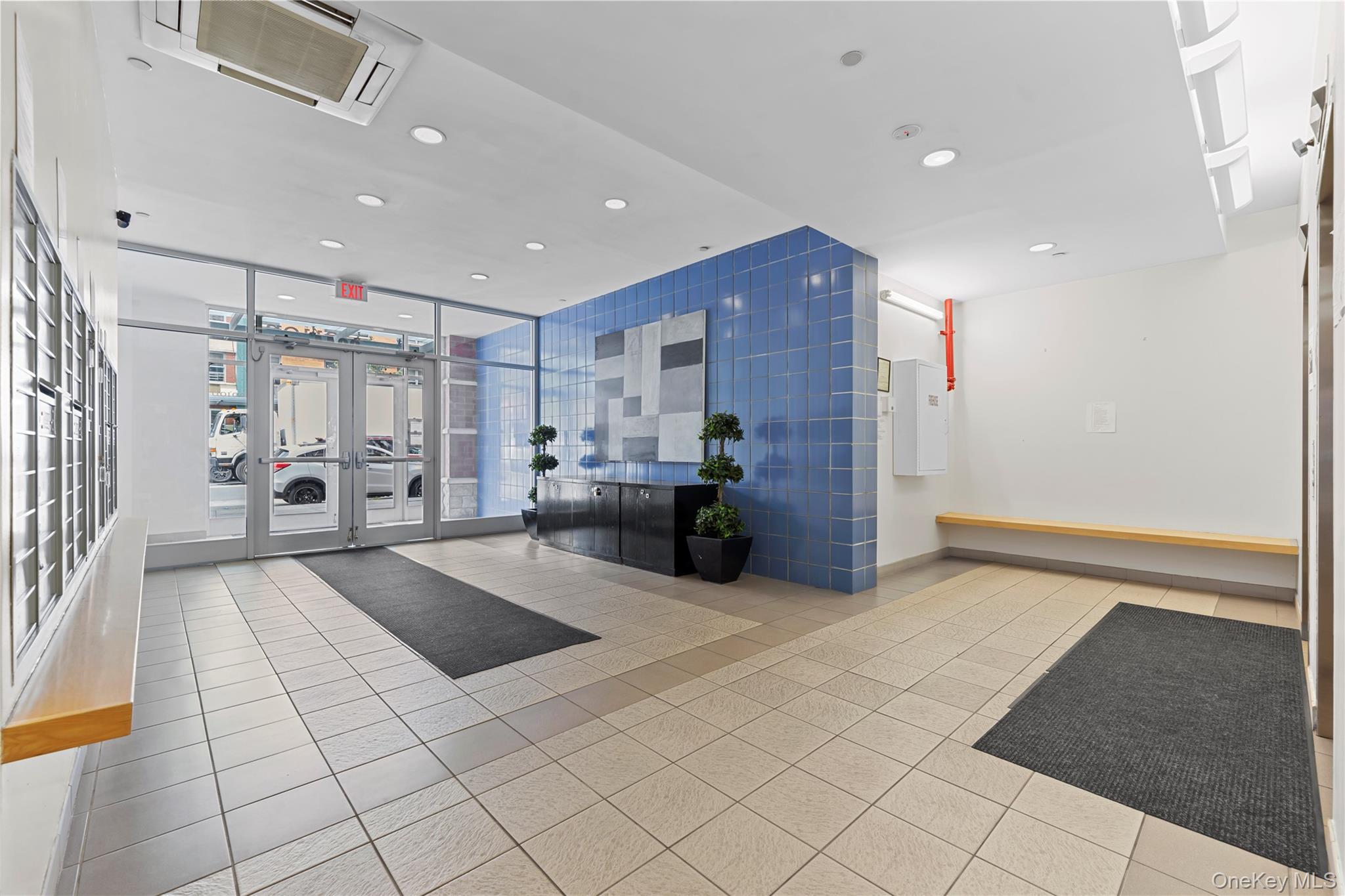 3044 3rd Avenue, Unit 6D Bronx, NY 10451 - Photo 15 of 19 a open kitchen with stainless steel appliances kitchen island granite countertop a refrigerator and a sink