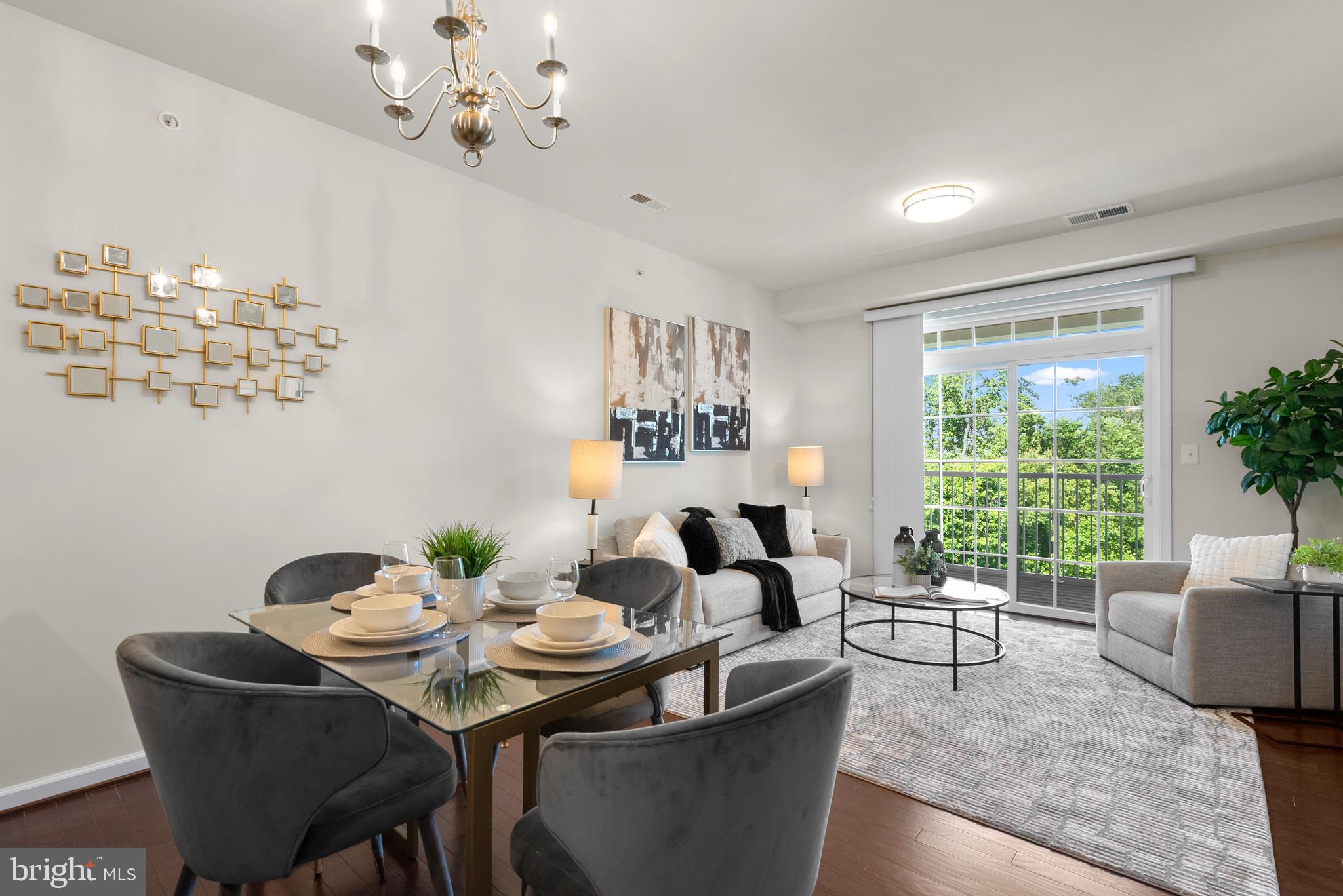 3835 Doc Berlin Drive, Unit 44 Silver Spring, MD 20906 - Photo 11 of 28 a living room with furniture and a large window