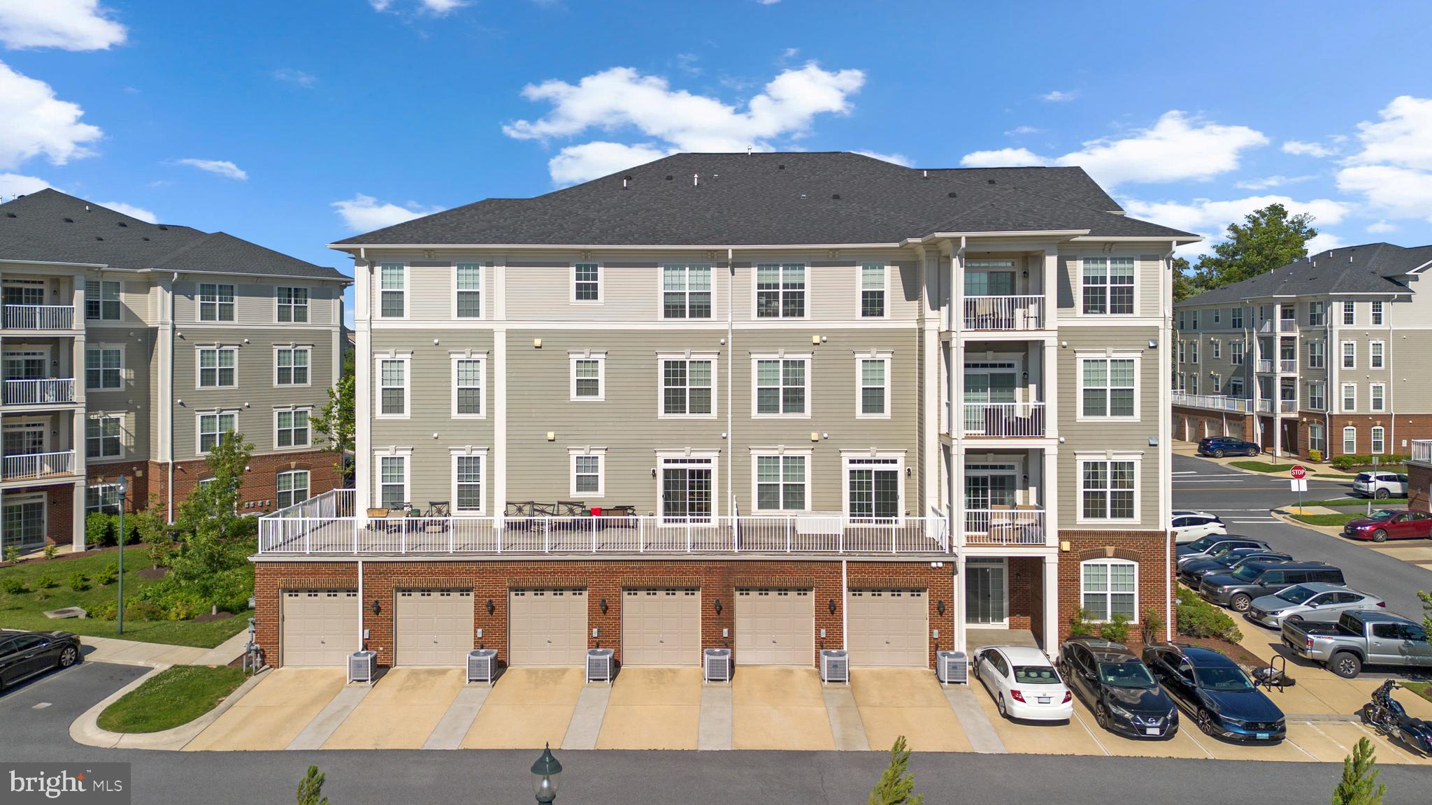 3835 Doc Berlin Drive, Unit 44 Silver Spring, MD 20906 - Photo 26 of 28 a front view of a building with a swimming pool