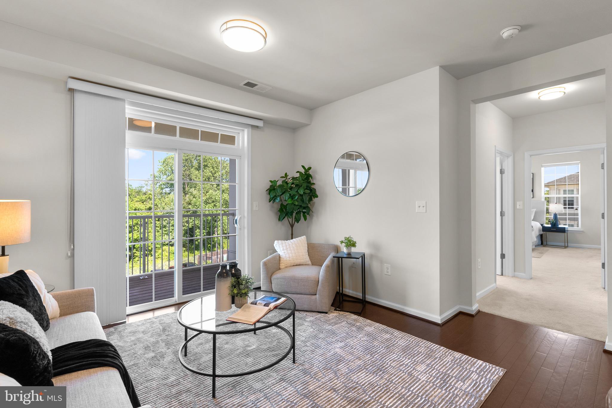 3835 Doc Berlin Drive, Unit 44 Silver Spring, MD 20906 - Photo 6 of 28 a living room with furniture and a large window