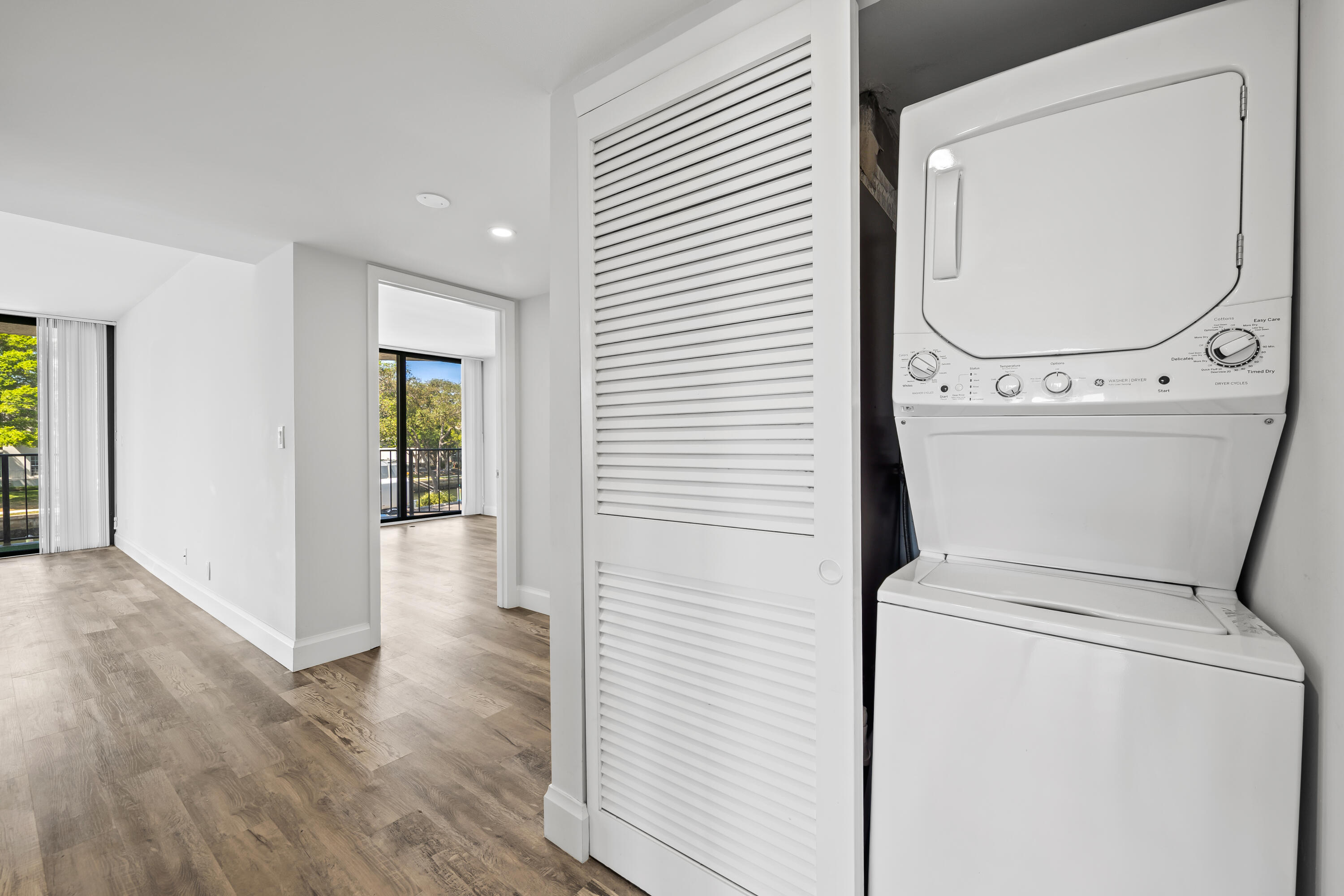 799 Jeffery Street, Unit 202 Boca Raton, FL 33487 - Photo 13 of 39 a view of a hallway with washer and dryer