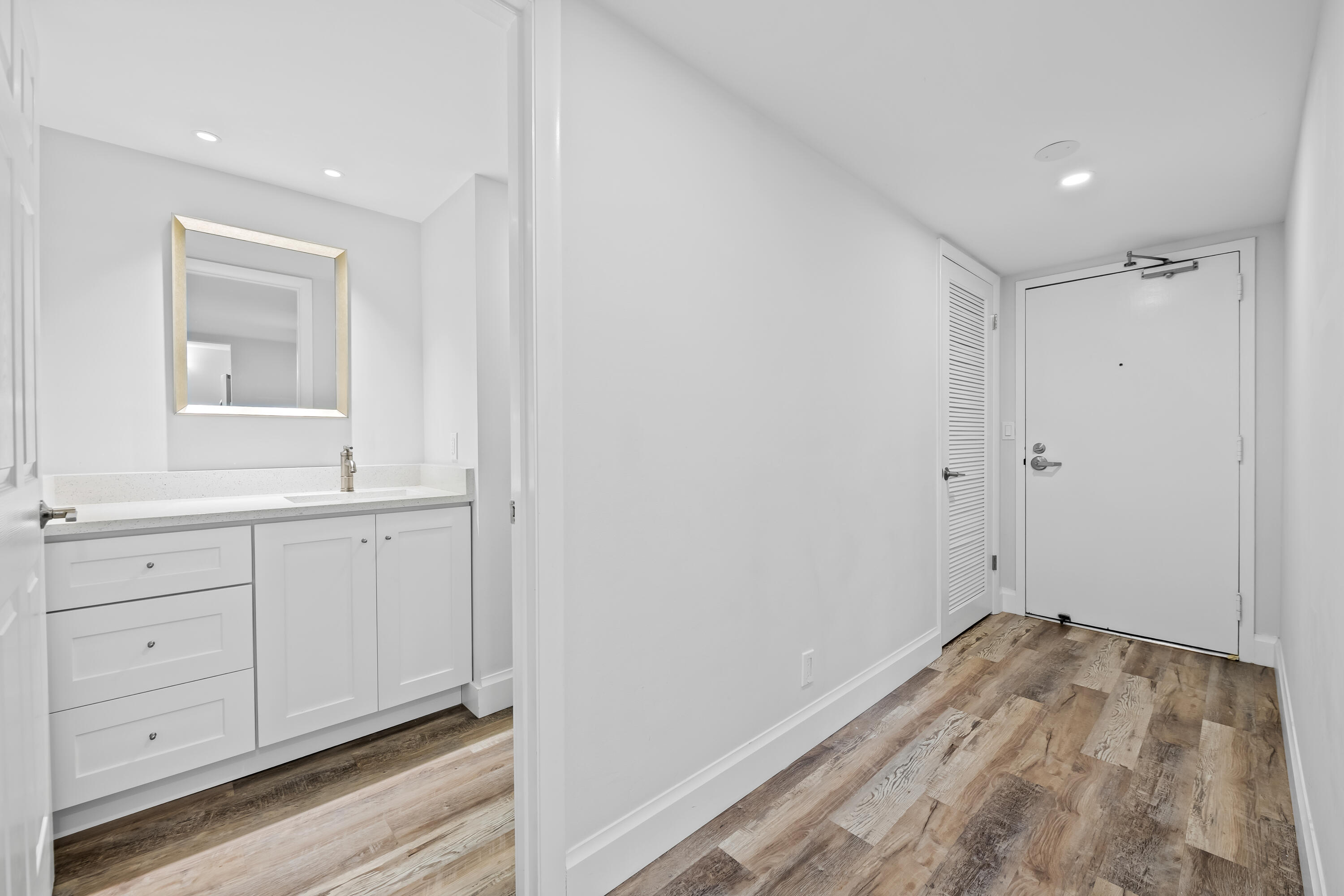 799 Jeffery Street, Unit 202 Boca Raton, FL 33487 - Photo 16 of 39 a view of bathroom with sink mirror and window