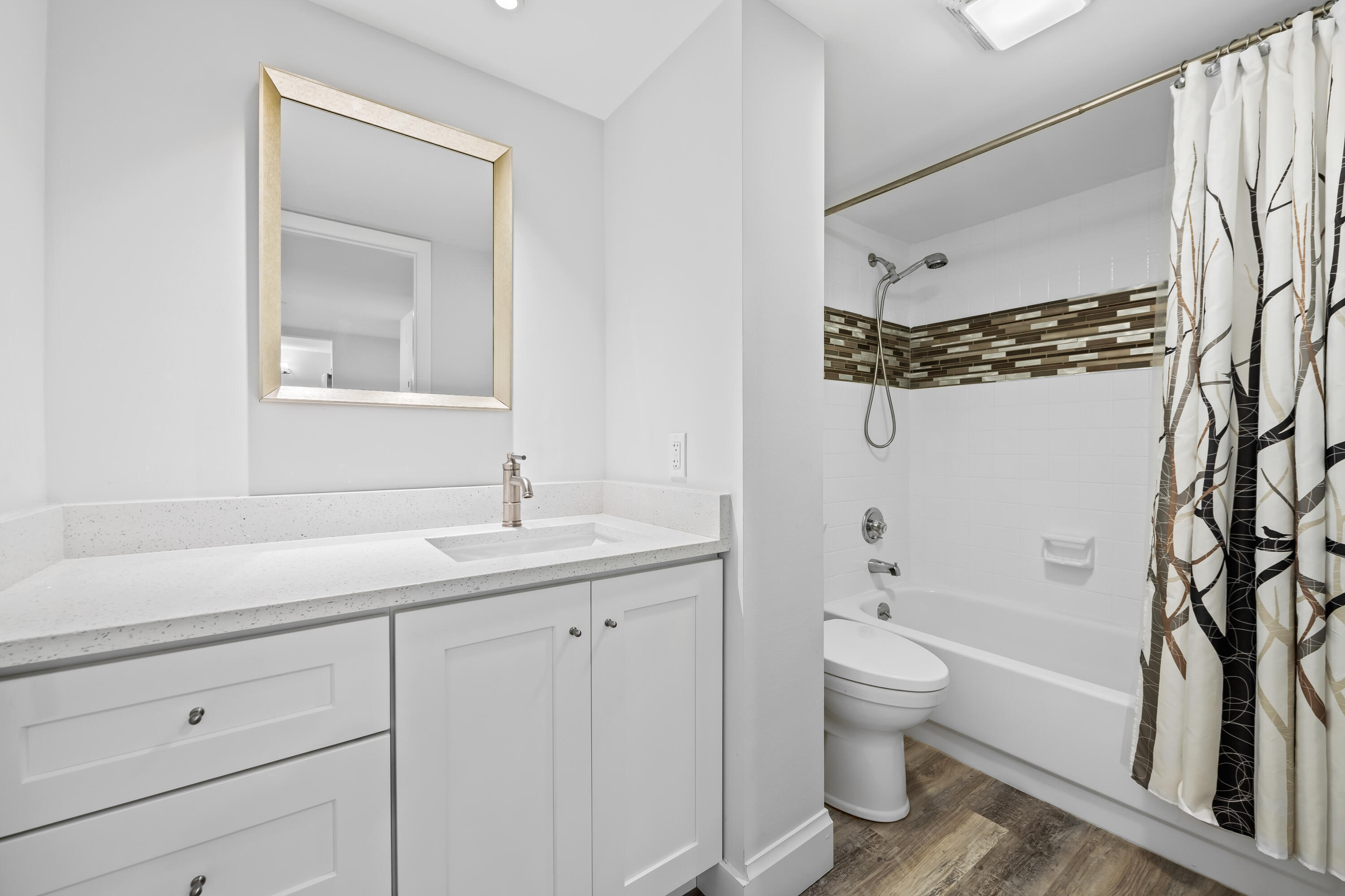 799 Jeffery Street, Unit 202 Boca Raton, FL 33487 - Photo 17 of 39 a bathroom with a sink a toilet and shower