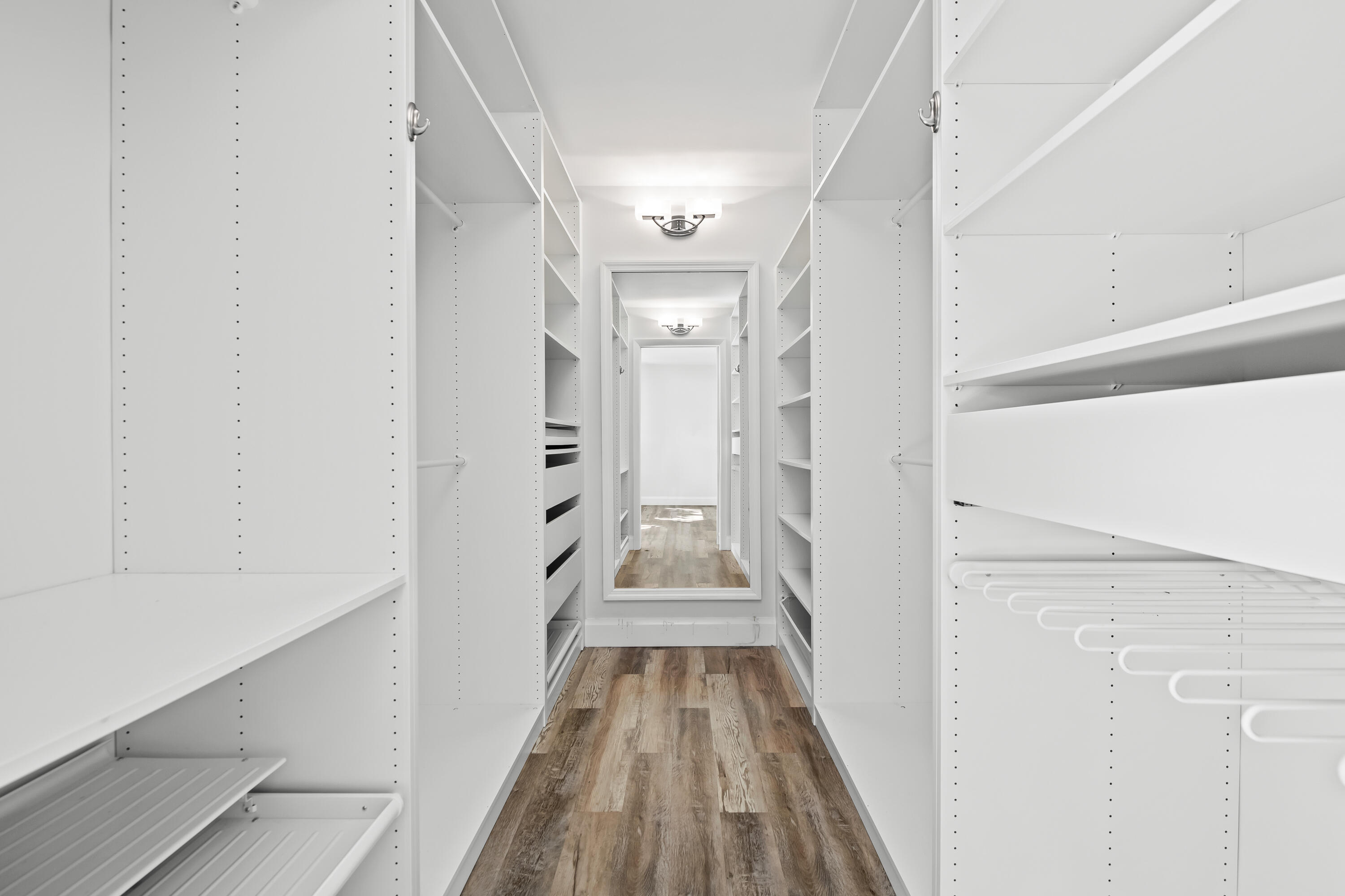 799 Jeffery Street, Unit 202 Boca Raton, FL 33487 - Photo 24 of 39 a view of a hallway with wooden floor and staircase