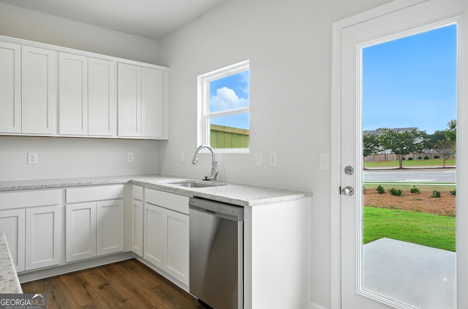 6 Umber Lane Newnan, GA 30263 - Photo 11 of 43 a kitchen with a sink cabinets and window