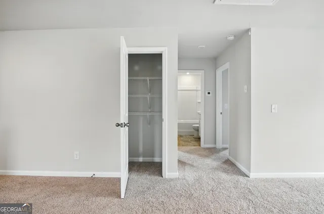 an empty room with closet