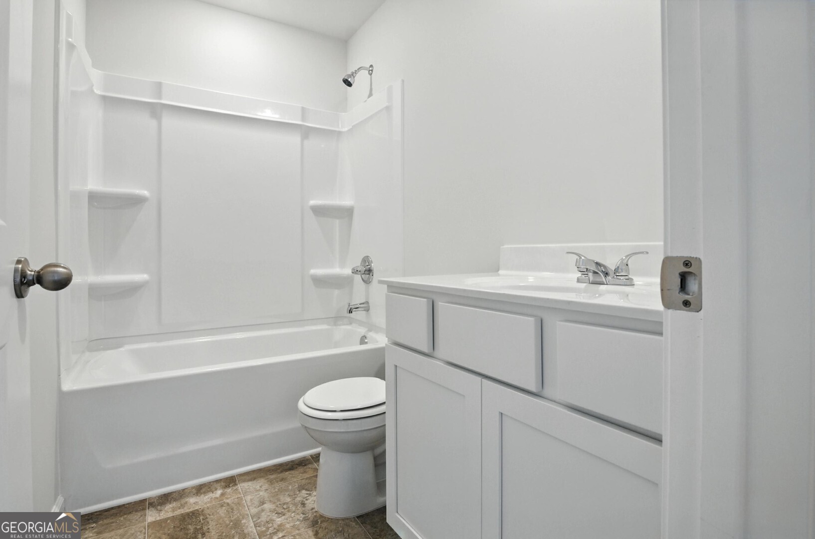 6 Umber Lane Newnan, GA 30263 - Photo 24 of 43 a bathroom with a sink toilet and shower