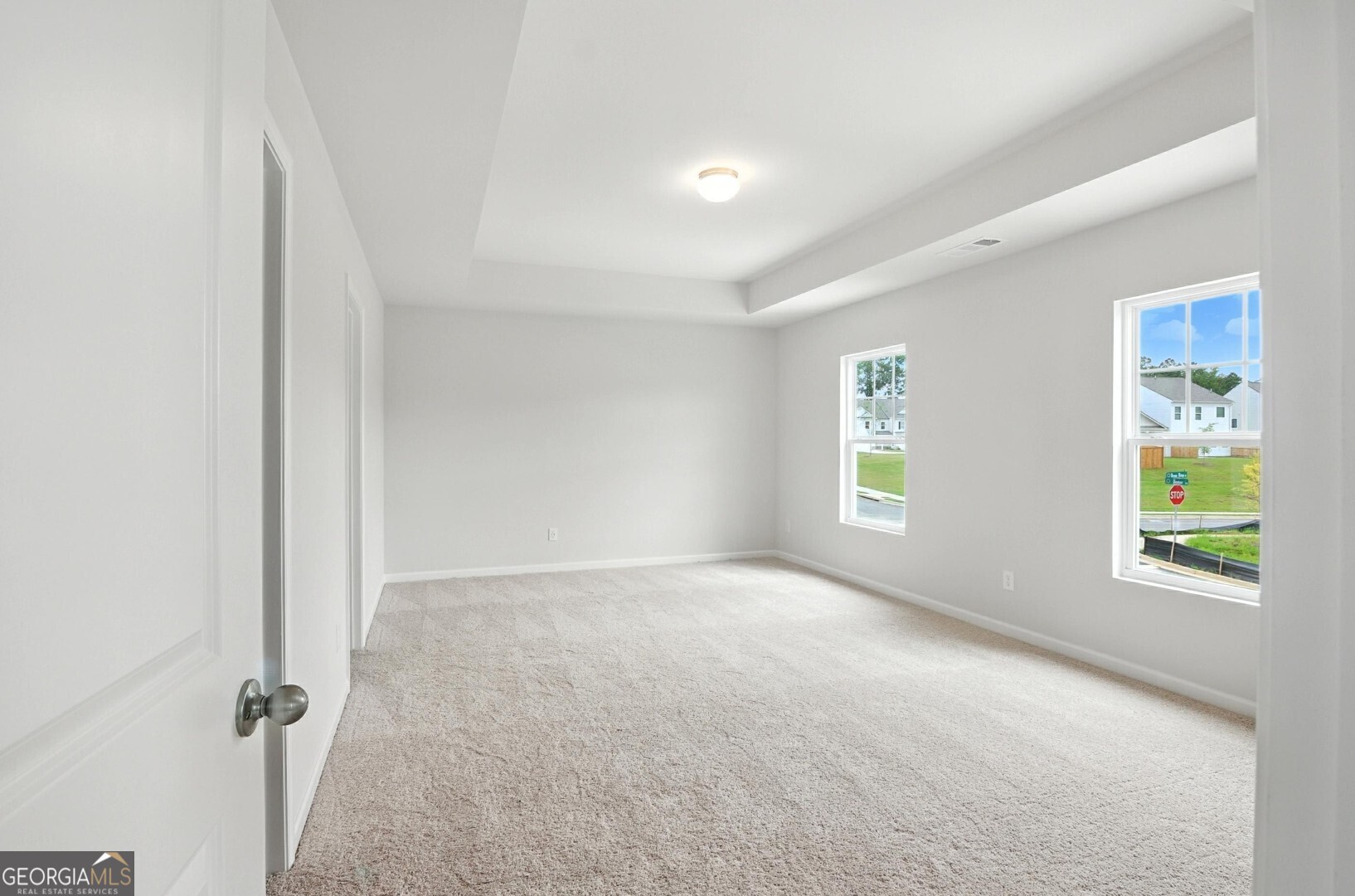 6 Umber Lane Newnan, GA 30263 - Photo 32 of 43 an empty room with windows