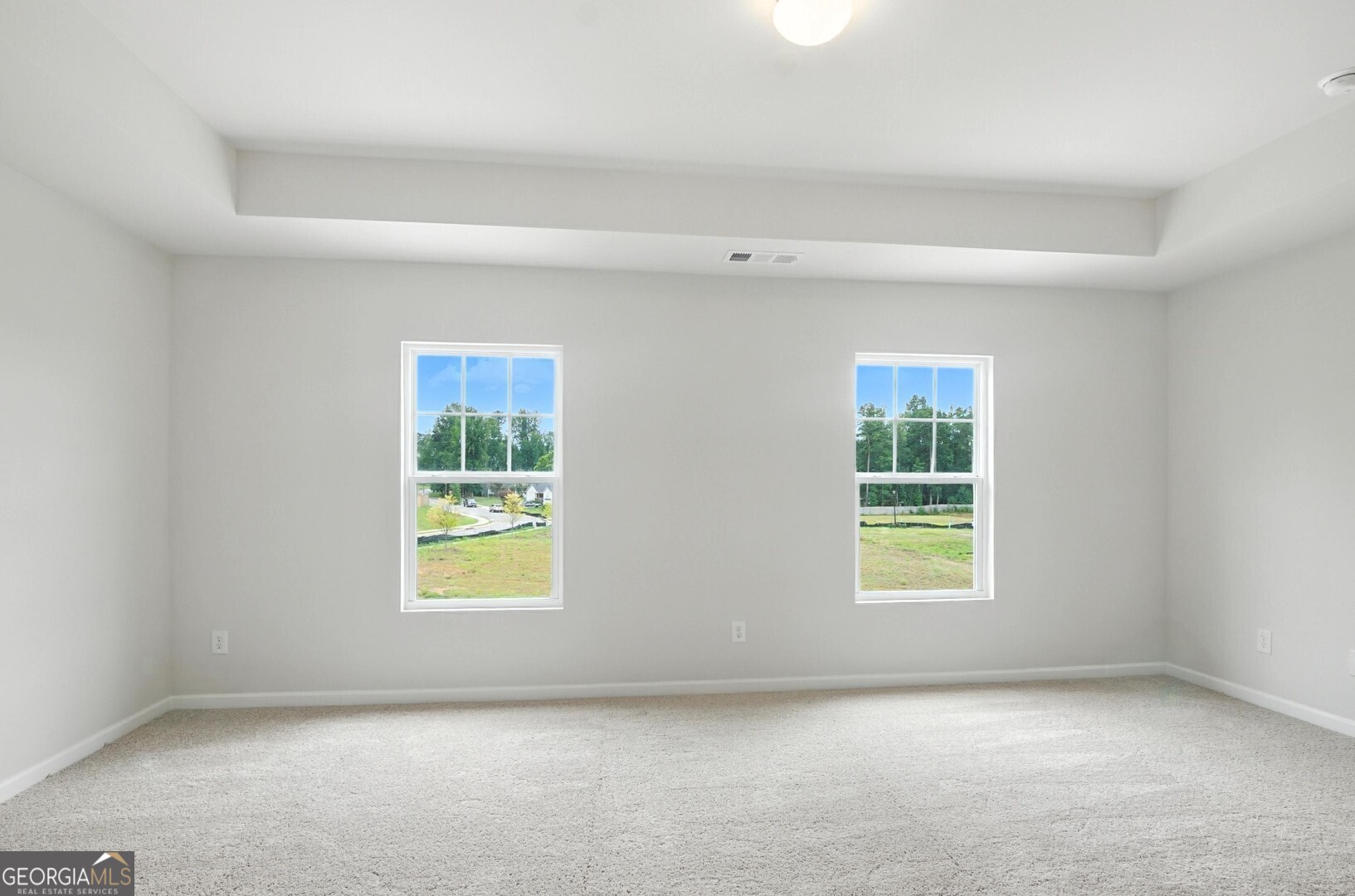 6 Umber Lane Newnan, GA 30263 - Photo 36 of 43 an empty room with windows