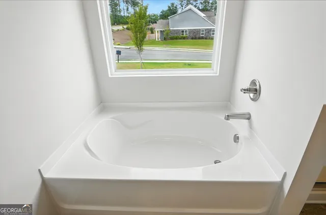 a bathroom with a bathtub