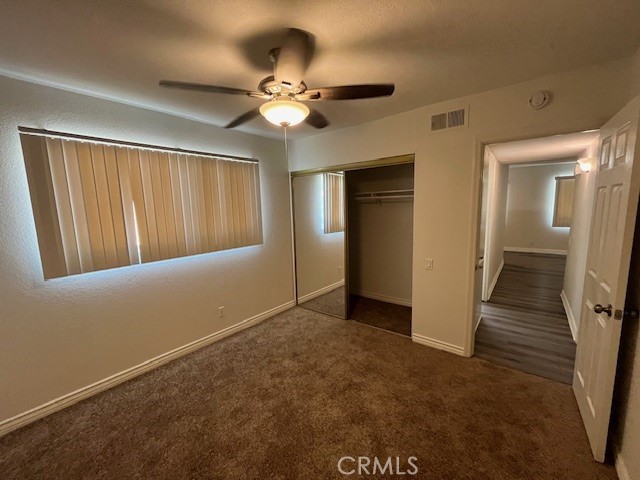 45313 Sunset Lane, Unit B6 #3 Palm Desert, CA 92260 - Photo 11 of 19 a view of a livingroom with a chandelier fan