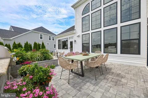 a outdoor living with furniture and garden view