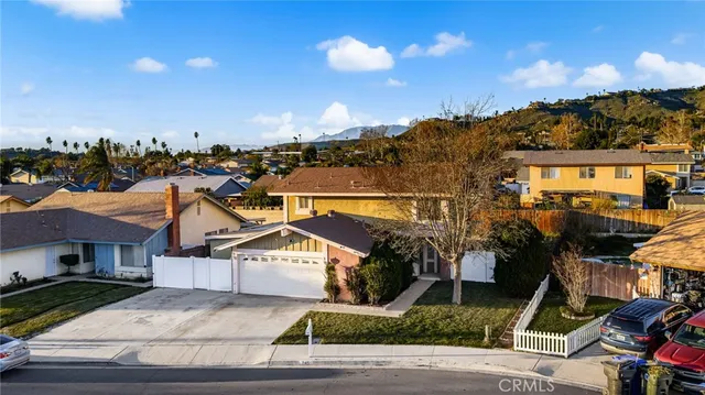 a view of a street in front of the house