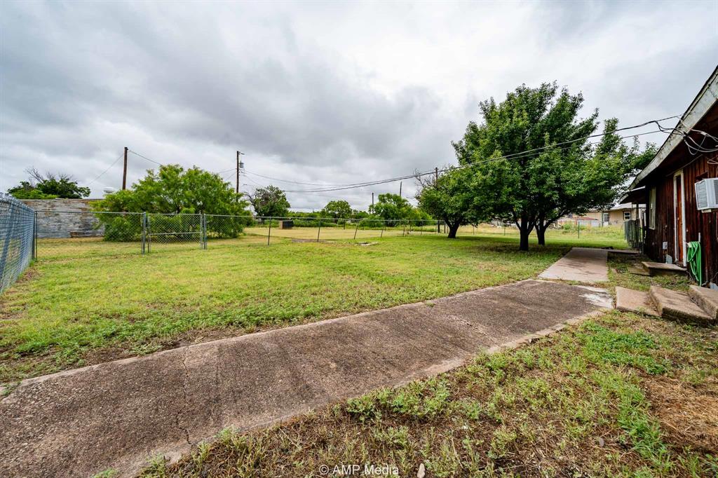 735 Northwest Ave F Hamlin, TX 79520 - Photo 6 of 18 a view of a park with large trees