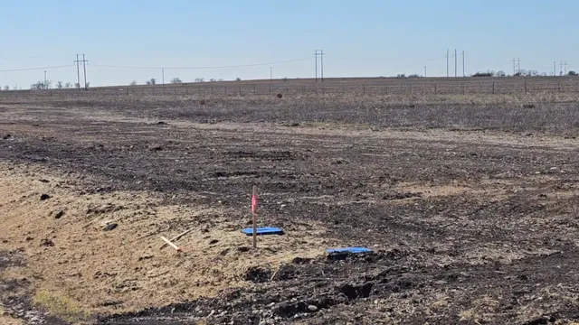 a view of a fireplace in a field
