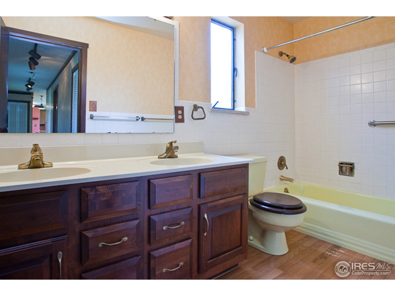 6686 Jay Road Boulder, CO 80301 - Photo 13 of 18 a bathroom with a sink and a mirror