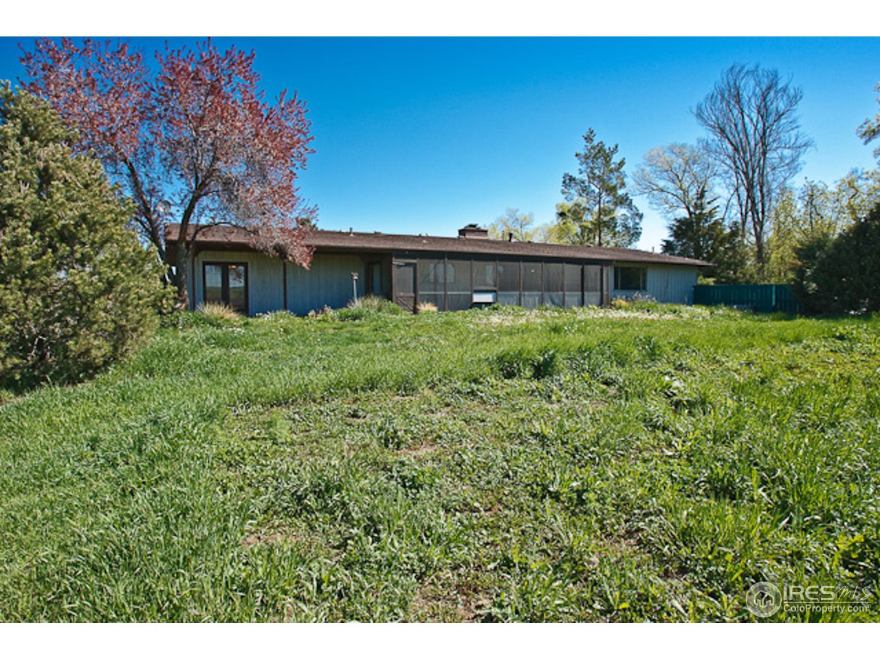 6686 Jay Road Boulder, CO 80301 - Photo 14 of 18 a view of backyard with a garden