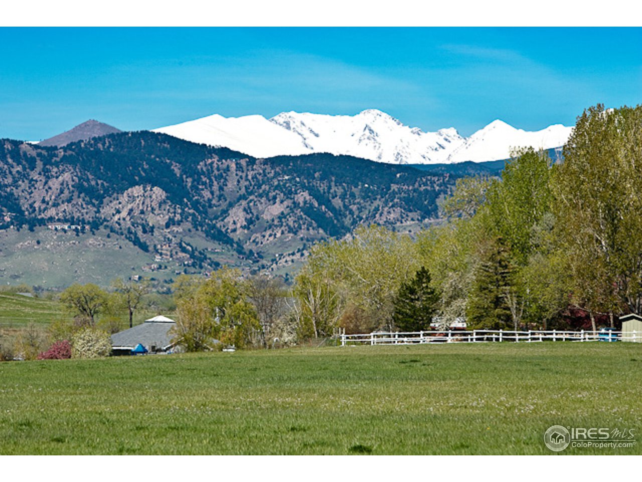 6686 Jay Road Boulder, CO 80301 - Photo 18 of 18 a view of a lush green hillside and houses