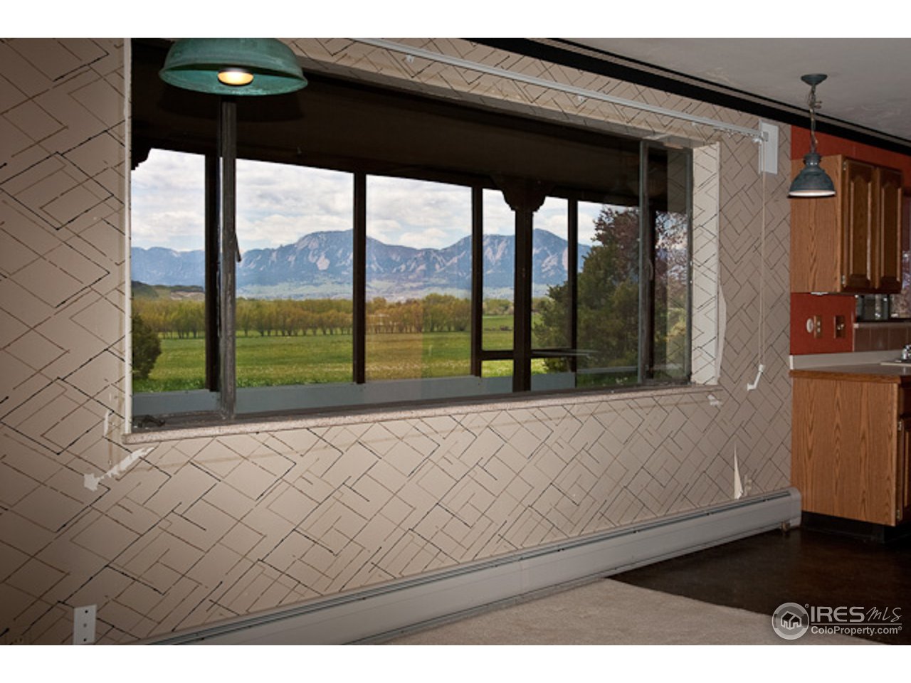 6686 Jay Road Boulder, CO 80301 - Photo 5 of 18 a living room with a large window