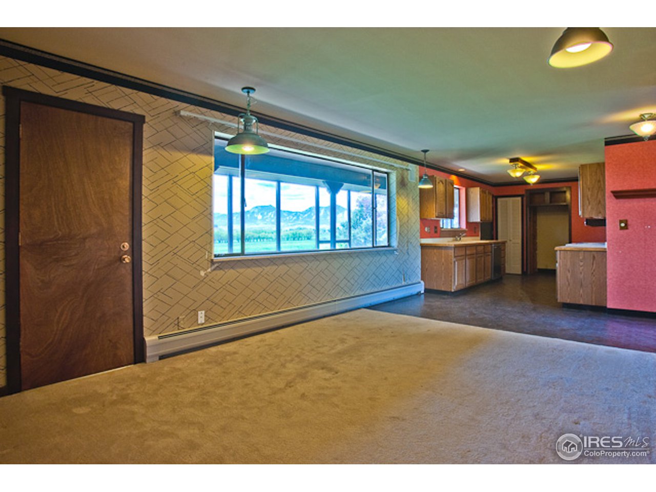 6686 Jay Road Boulder, CO 80301 - Photo 6 of 18 a view of an empty room with a window