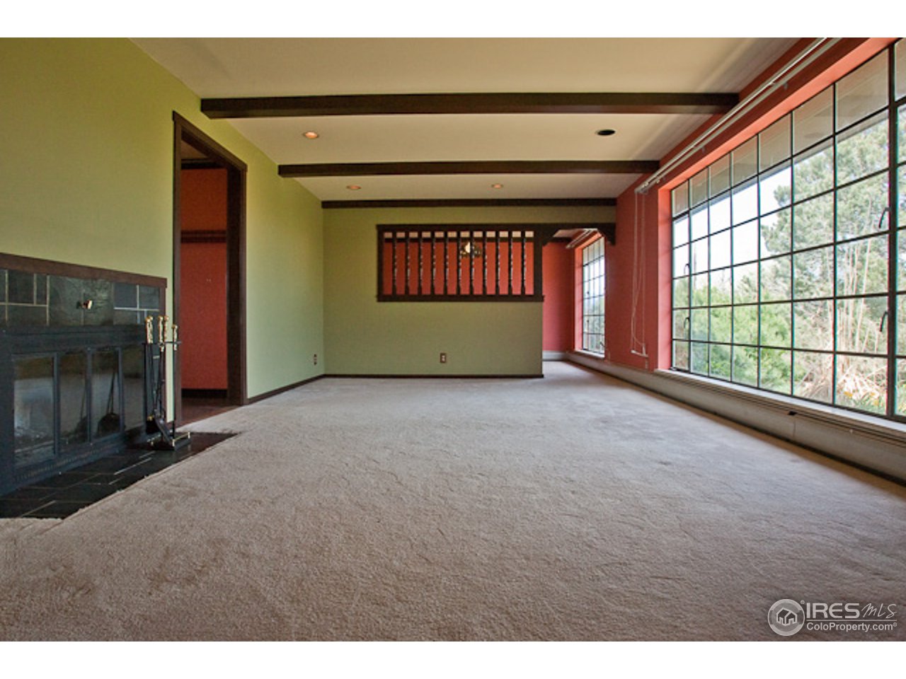 6686 Jay Road Boulder, CO 80301 - Photo 8 of 18 a view of an empty room with a window