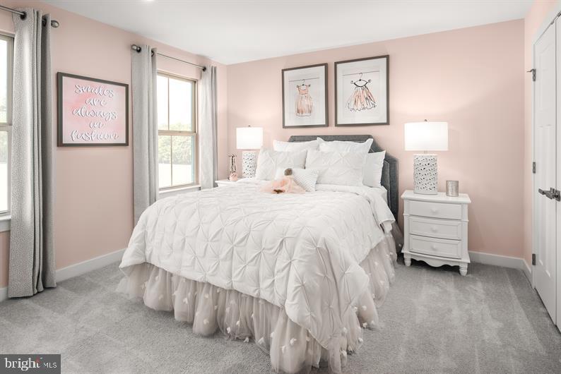 334 Ruffian Rd Camp Hill Camp Hill, PA 17011 - Photo 17 of 24 a spacious bedroom with a bed and a window