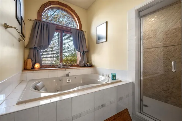 a bathroom with a sink and a large mirror