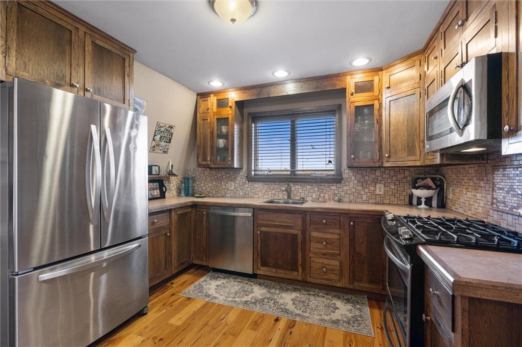338 Quarry Road Washington, PA 15301 - Photo 21 of 50 a kitchen with stainless steel appliances granite countertop a refrigerator a sink dishwasher a stove and a refrigerator