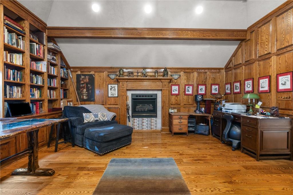 338 Quarry Road Washington, PA 15301 - Photo 45 of 50 a living room with furniture a fireplace and bookshelf