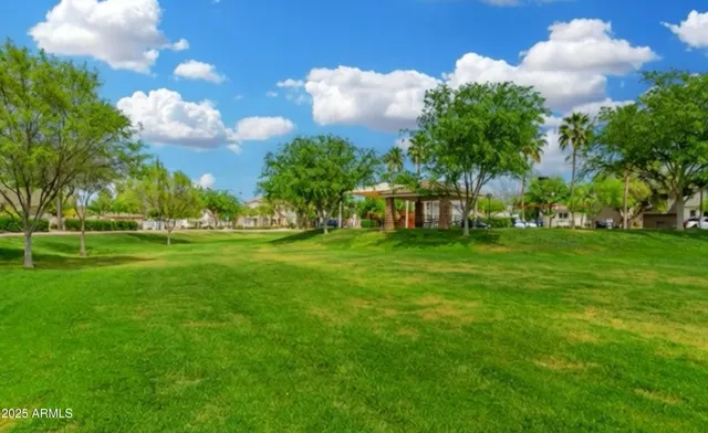 a view of a building with a big yard