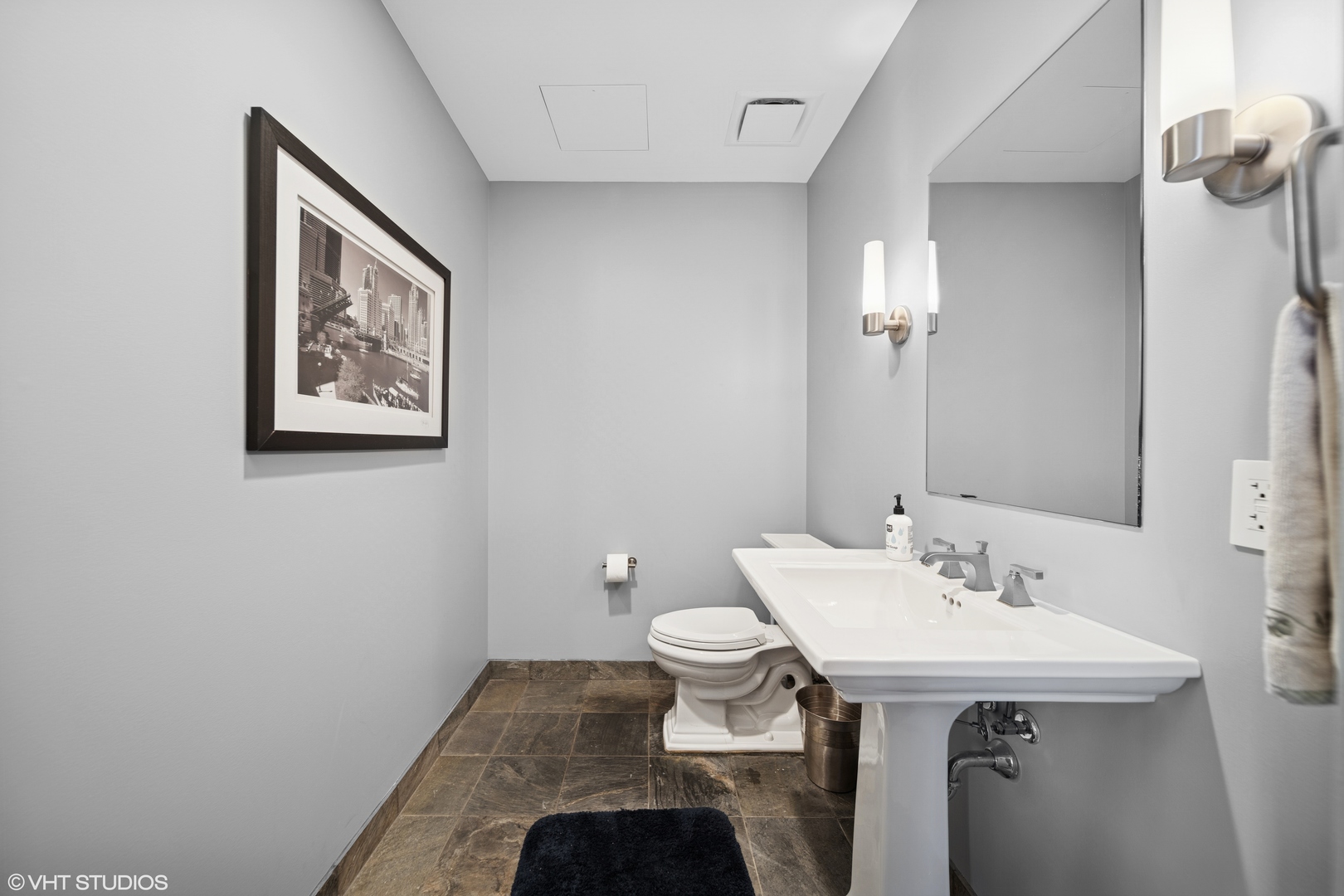 401 North Wabash Avenue, Unit 56D Chicago, IL 60611 - Photo 12 of 24 a bathroom with a sink and a mirror