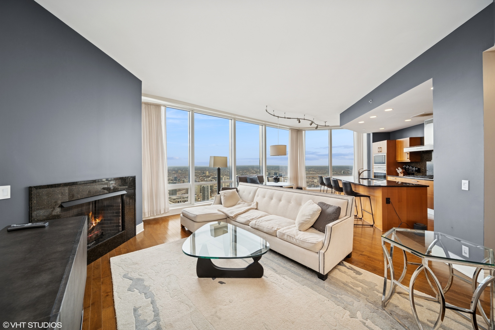 401 North Wabash Avenue, Unit 56D Chicago, IL 60611 - Photo 6 of 24 a living room with furniture and a flat screen tv