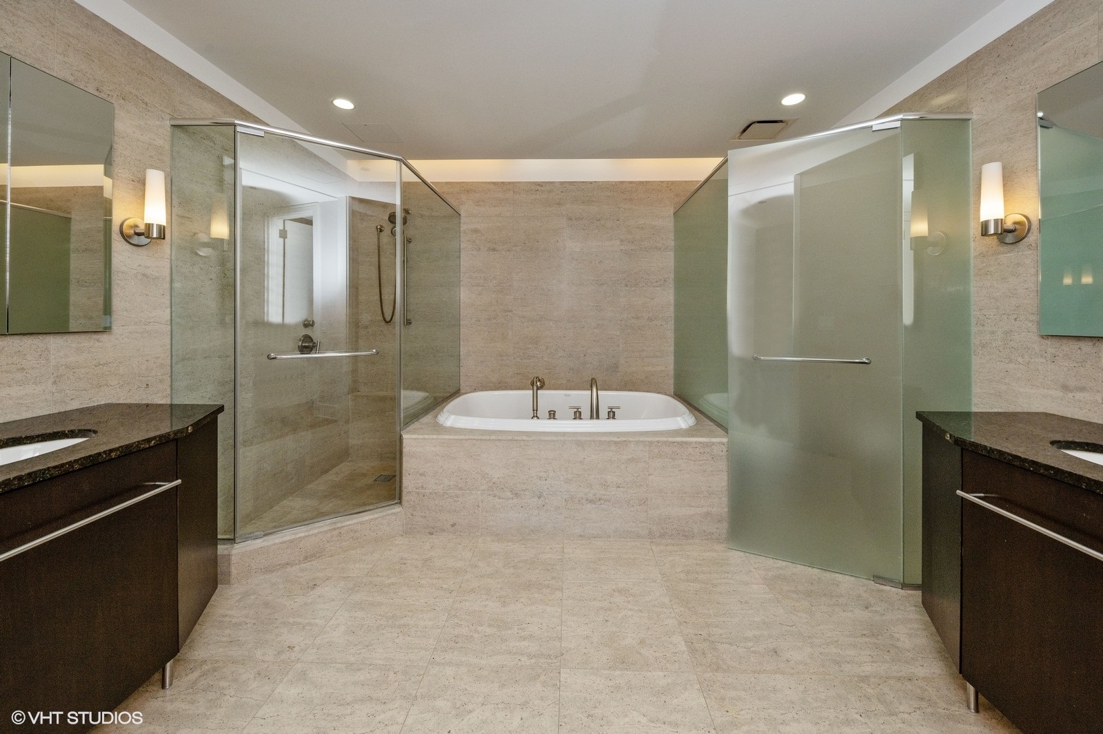 401 North Wabash Avenue, Unit 56D Chicago, IL 60611 - Photo 10 of 24 a bathroom with a bathtub shower sink and mirror