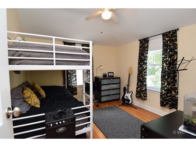 924 Spring Road Elmhurst, IL 60126 - Photo 12 of 18 a view of room with stairs and children