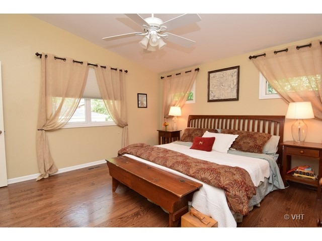 924 Spring Road Elmhurst, IL 60126 - Photo 10 of 18 a bedroom with a bed and a window