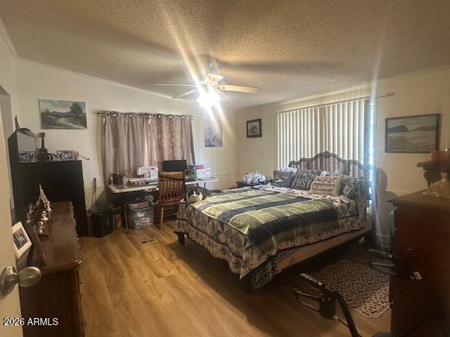 7258 South Lariat Road Hereford, AZ 85615 - Photo 15 of 37 a bedroom with a bed and a dresser