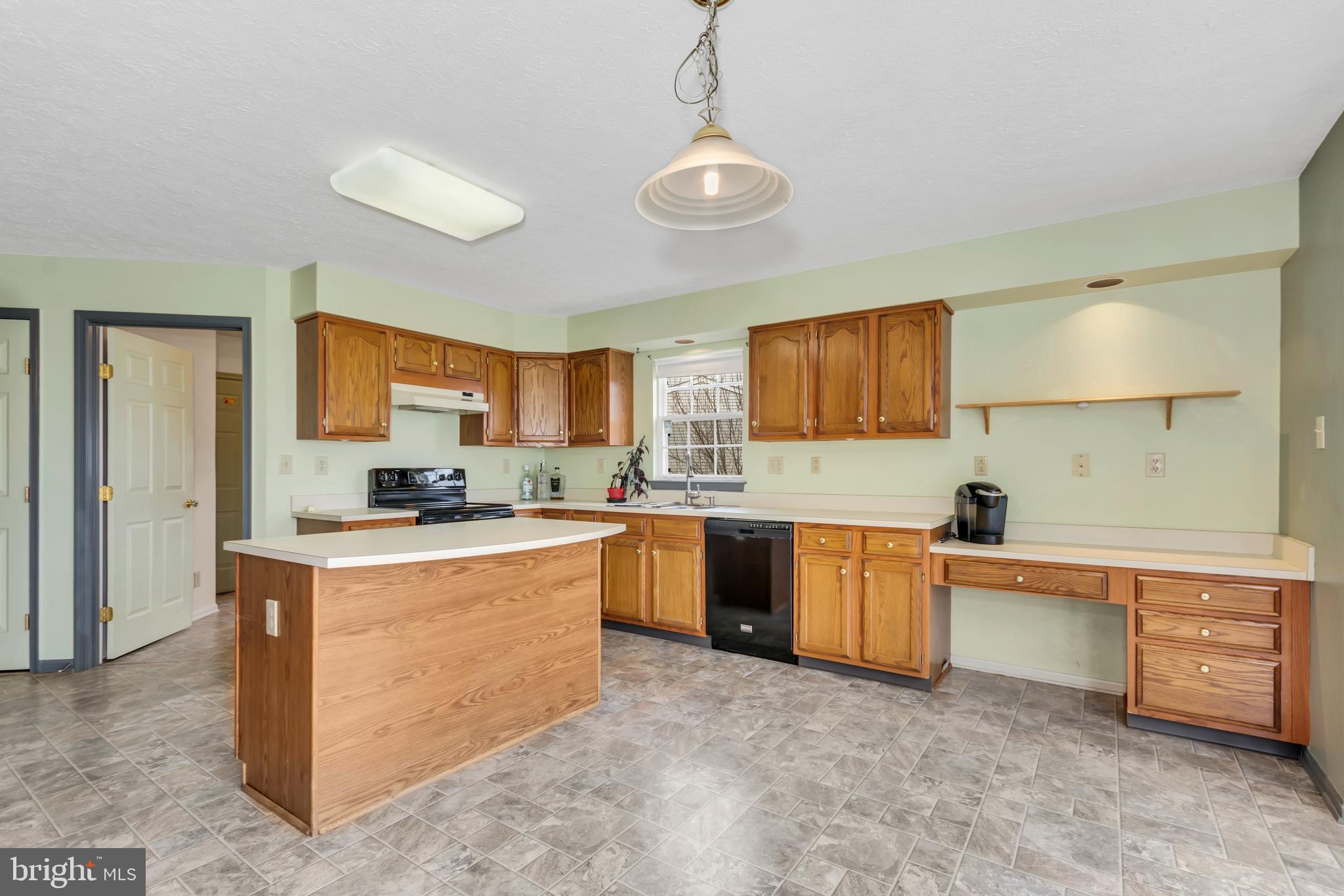 2908 Garwood Road Sicklerville, NJ 08081 - Photo 9 of 25 a kitchen with stainless steel appliances granite countertop a stove top oven a sink dishwasher and a refrigerator