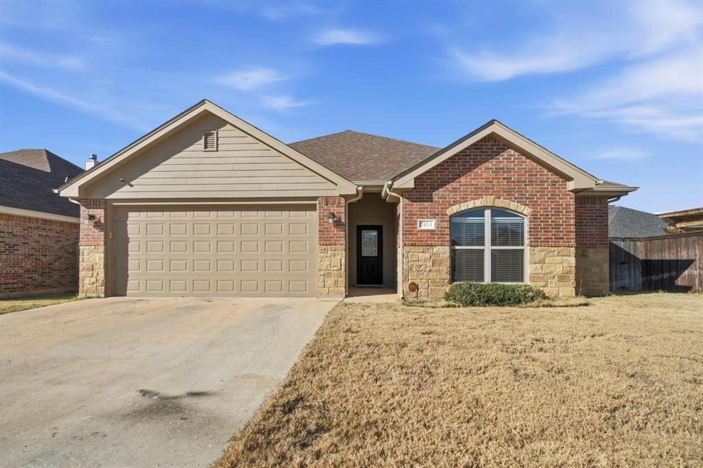 7414 Morning Glory Road Abilene, TX 79602 - Photo 13 of 34 a front view of a house with a yard