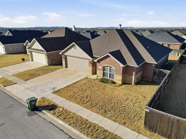 a view of a house with a terrace
