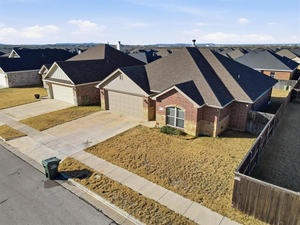 7414 Morning Glory Road Abilene, TX 79602 - Photo 14 of 34 a view of a house with a terrace