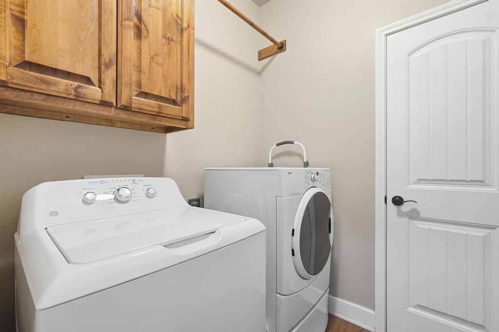 7414 Morning Glory Road Abilene, TX 79602 - Photo 15 of 34 a utility room with dryer and washer