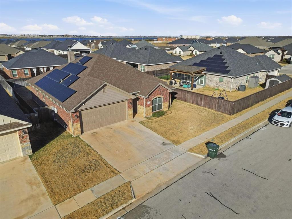 7414 Morning Glory Road Abilene, TX 79602 - Photo 9 of 34 an aerial view of residential houses with outdoor space