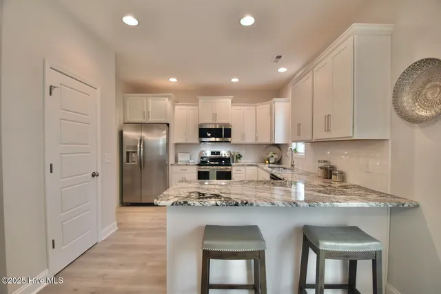 $449,500 | 229 South Bandwheel Way, Hampstead, NC 28443