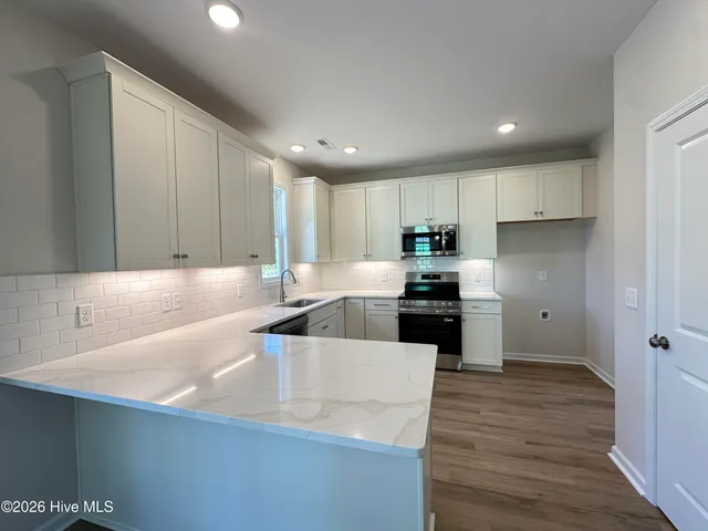 $449,500 | 229 South Bandwheel Way, Hampstead, NC 28443