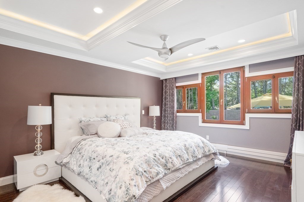 113 Deborah Road Newton, MA 02459 - Photo 23 of 34 a bedroom with a large bed and a window